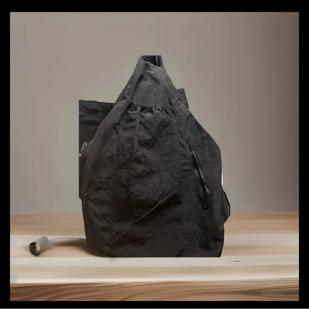 GAIAM Black Sling Backpack - Compact Crossbody Pack